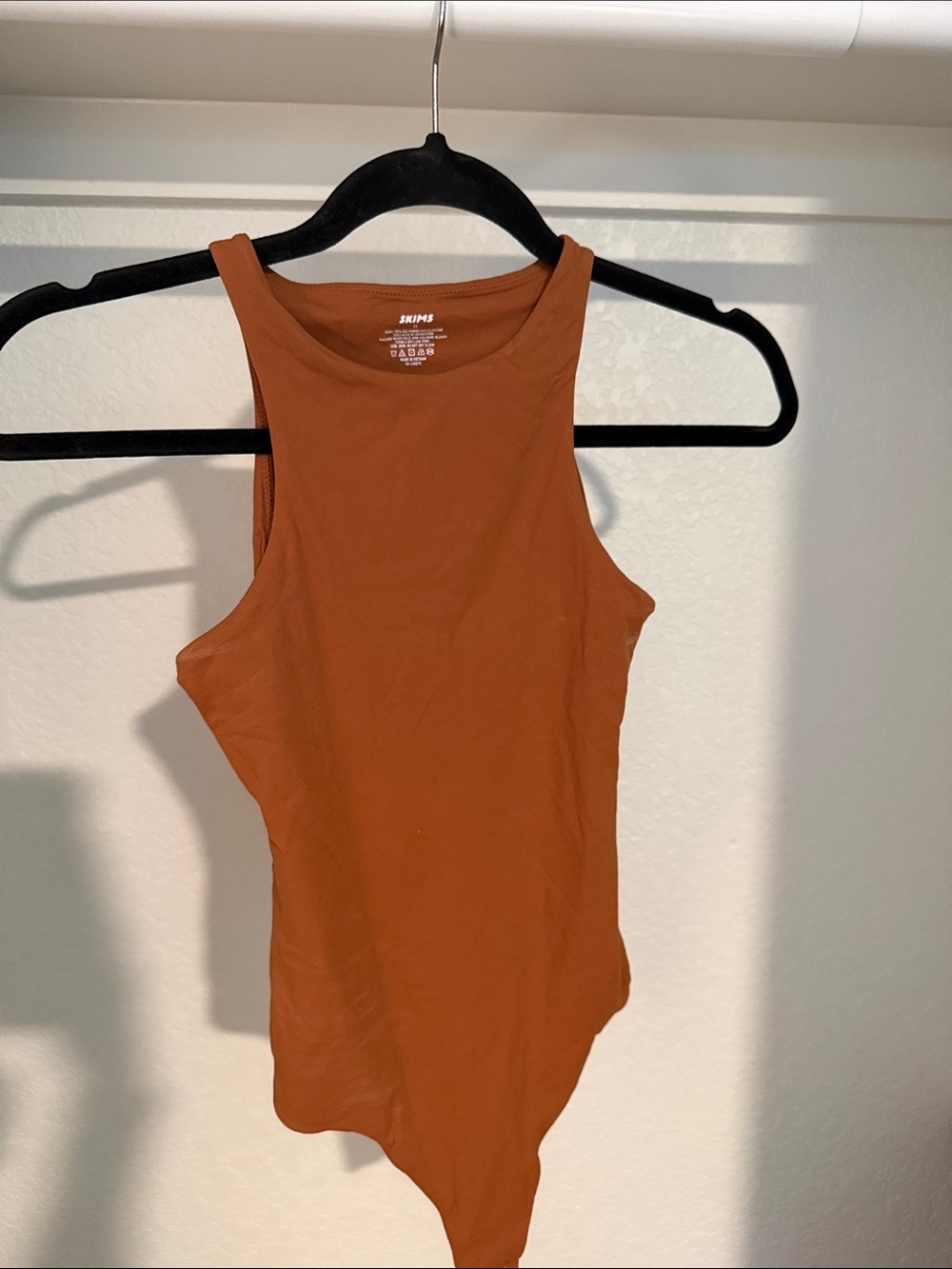 SKIMS Rust Orange Sleeveless High-Neck Bodysuit